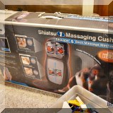 E26. Shiatsu massaging cushion. 